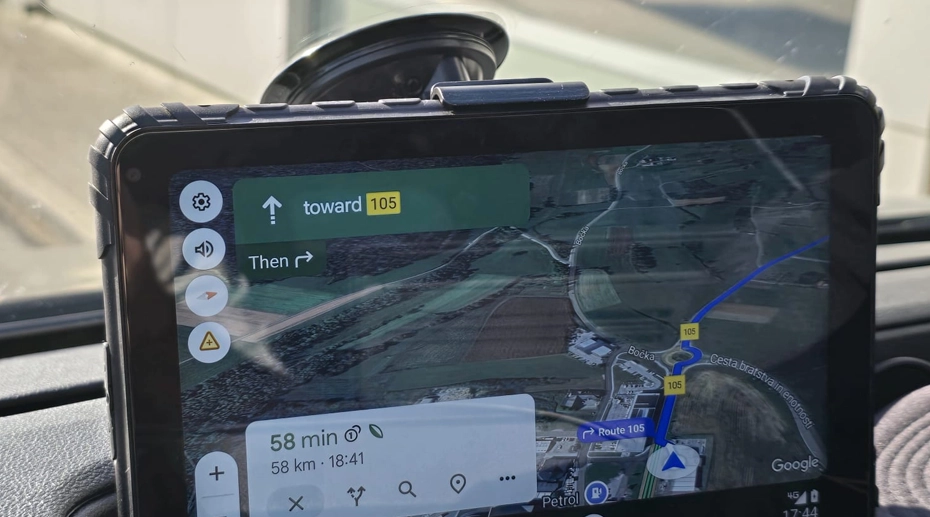 8-inch rugged Android tablet mounted in a truck cab with 1000-nit anti-glare display and quick-release dock